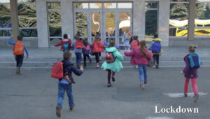 Lockdown - A group of children running into a building